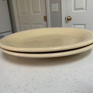 Two Fiesta Ivory Dinner Plates